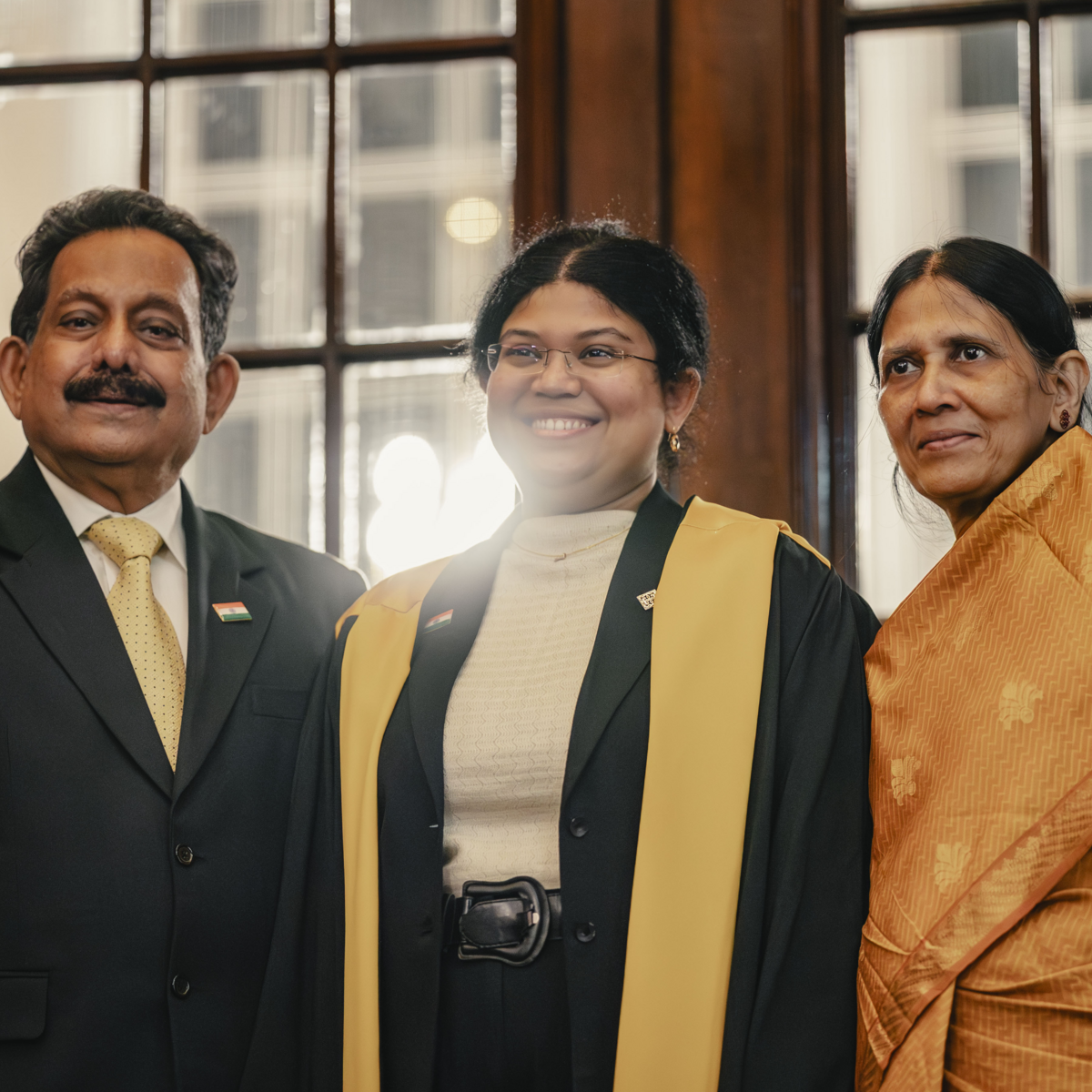 A diplomate posing with their family